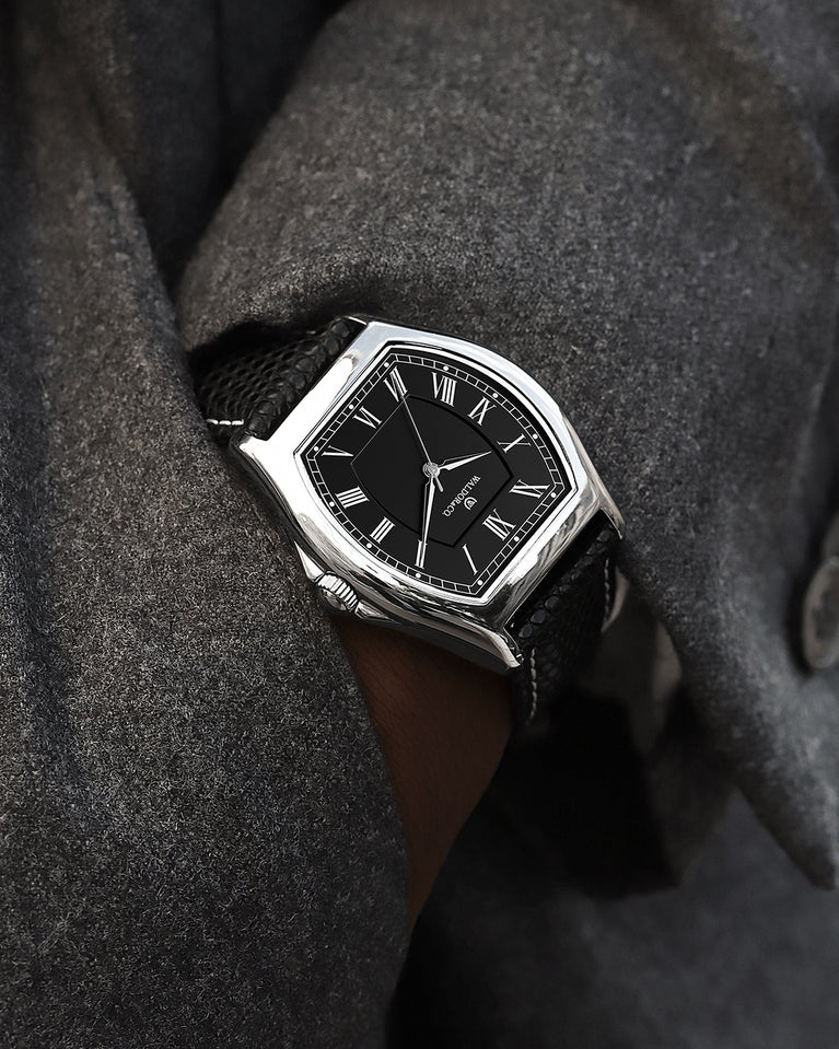 A square mens watch in Rhodium-plated 316L stainless steel from Waldor & Co. with white dial. Ronda movement. The model is Constant 40 Tremezzo 37x45mm.