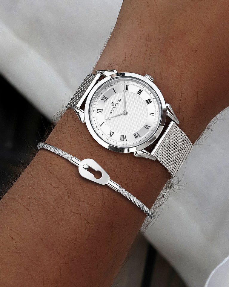 A round watch in silver from Waldor & Co. with blue sunray patterned dial. Ronda movement. The model is Original 40 Côte d'Azur 40mm.