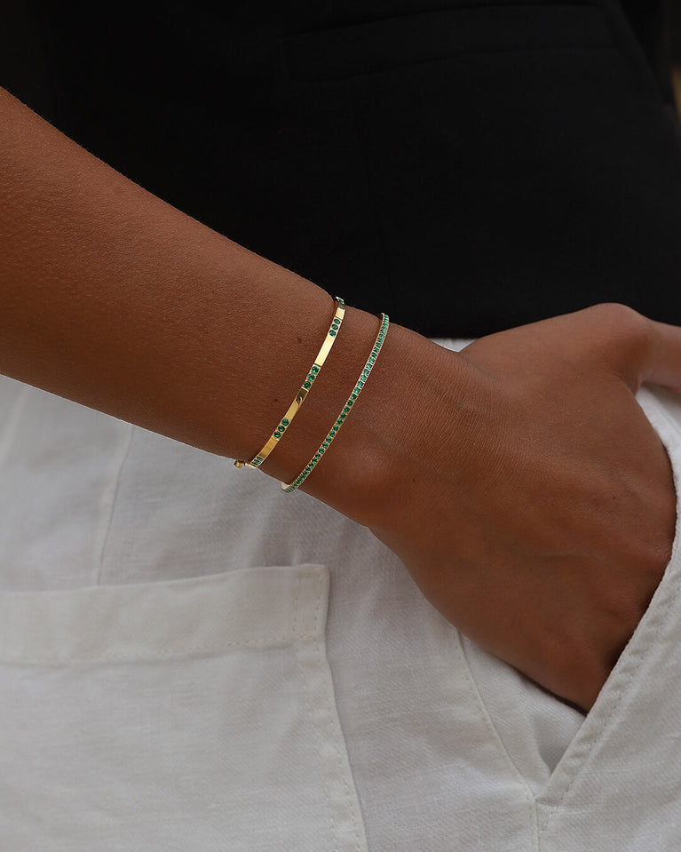 A Bangle in 14k gold-plated 316L stainless steel from Waldor & Co. One size. The model is Dulcet Bangle Polished.