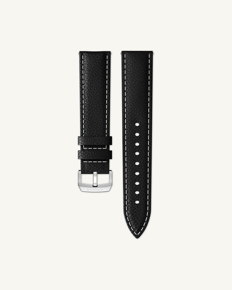 Black Leather strap 20mm with white seam details and adjustable tang buckle, suitable for all wrist sizes.