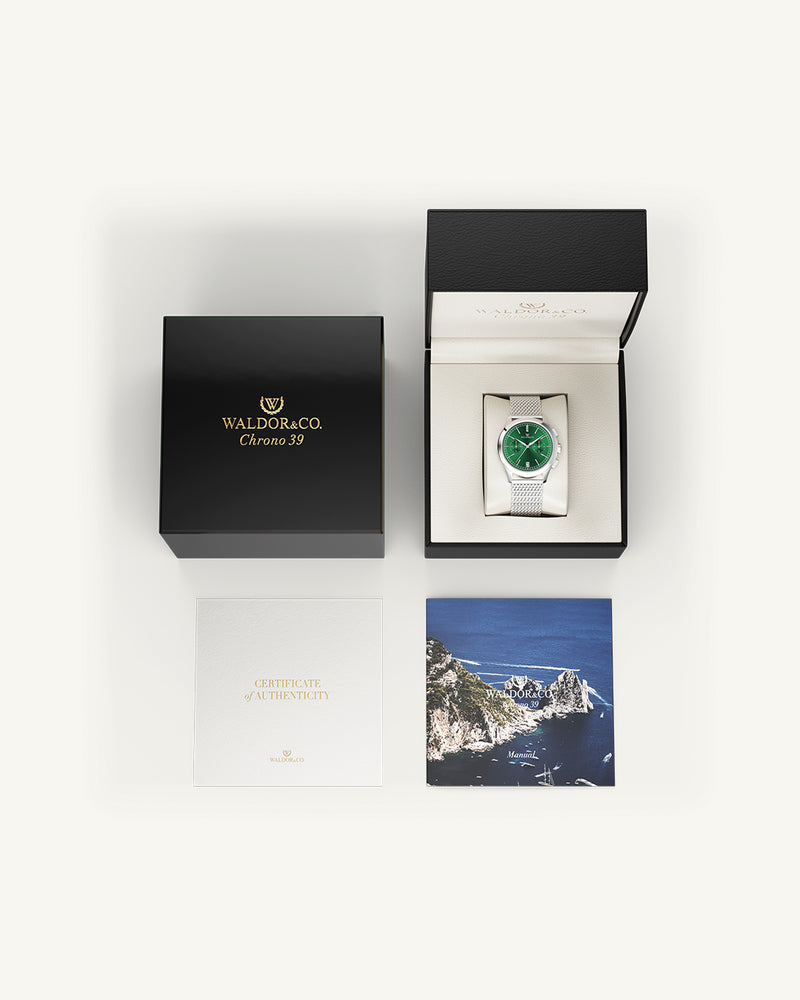 A round mens watch in rhodium-plated silver from Waldor & Co. with deep-green sunray dial and a second hand. Seiko movement. The model is Chrono 39 Sardinia 39mm.