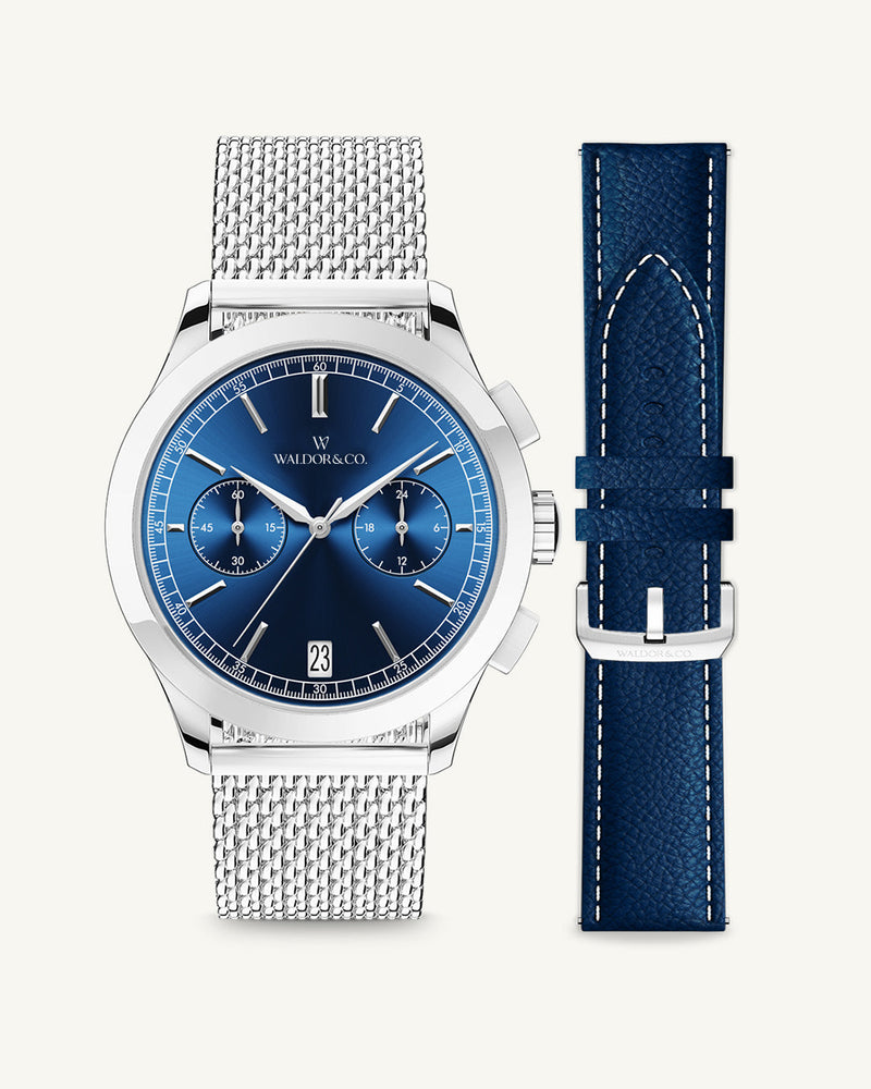 A round mens watch in rhodium-plated silver from Waldor & Co. with blue sunray dial and a second hand. Seiko movement. The model is Chrono 44 Sardinia 44mm.