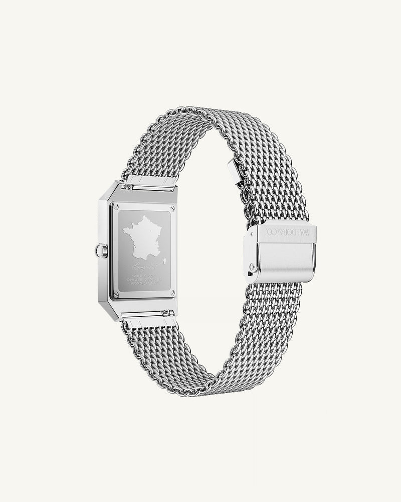 A square mens watch in rhodium-plated silver from Waldor & Co. with blue sunray dial. Miyota movement. The model is Conceptual 37 Antibes.