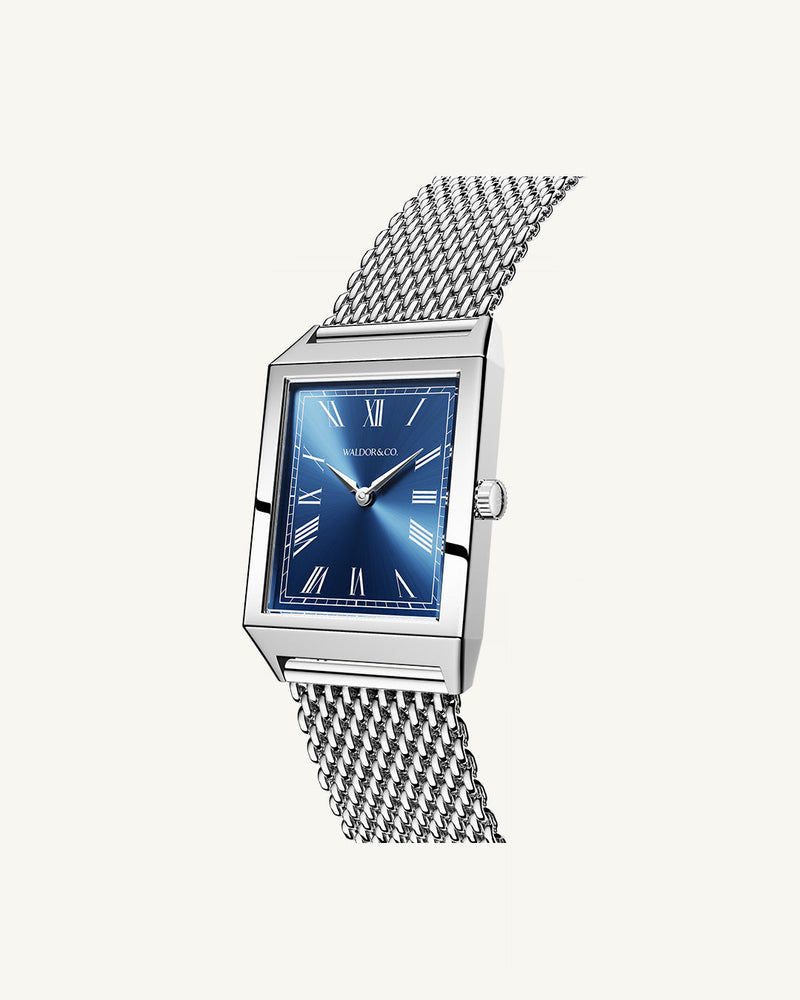 A square mens watch in rhodium-plated silver from Waldor & Co. with blue sunray dial. Miyota movement. The model is Conceptual 37 Antibes.
