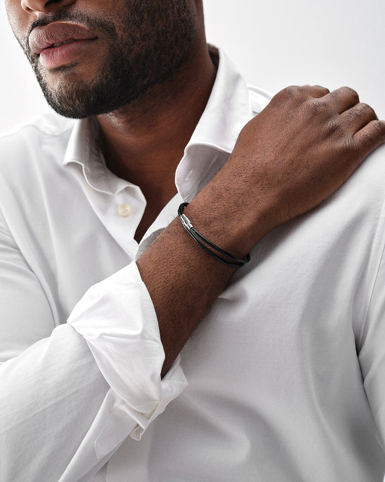 A Leather Bracelet in polished Silver plated-316L stainless steel from Waldor & Co. The model is Dual Leather Bracelet Polished.