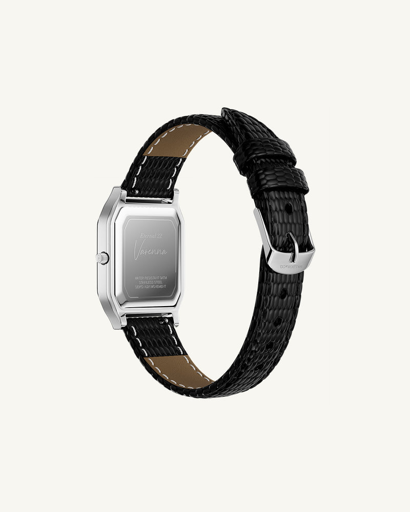 A square womens watch in Rhodium-plated 316L stainless steel from Waldor & Co. with white Diamond Cut Sapphire Crystal glass dial. Strap in black Genuine leather. Seiko movement. The model is Eternal 22 Varenna.