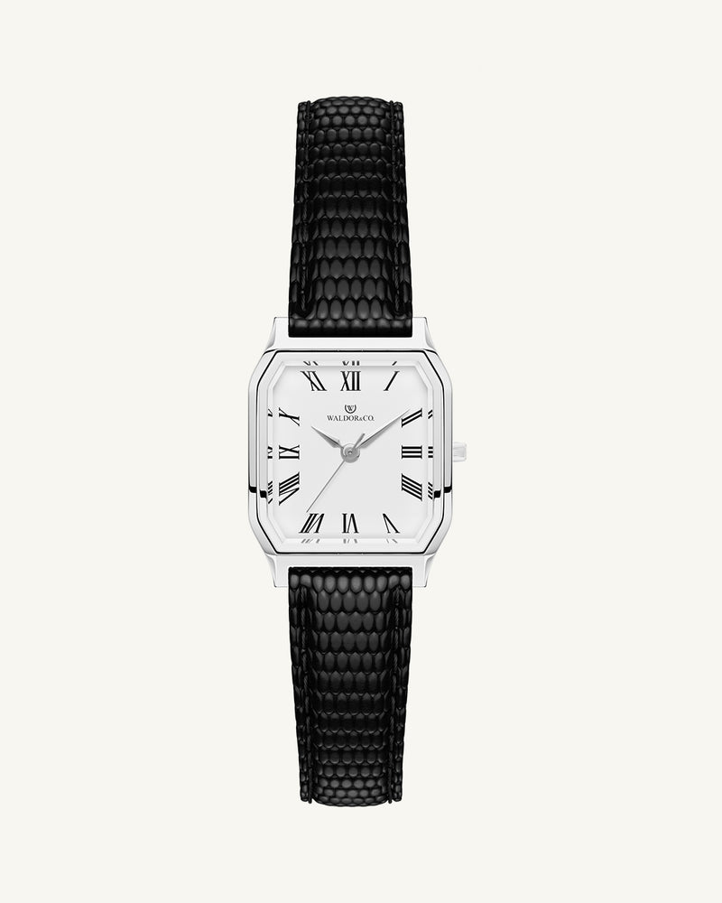 A square womens watch in Rhodium-plated 316L stainless steel from Waldor & Co. with white Diamond Cut Sapphire Crystal glass dial. Strap in black Genuine leather. Seiko movement. The model is Eternal 22 Varenna.