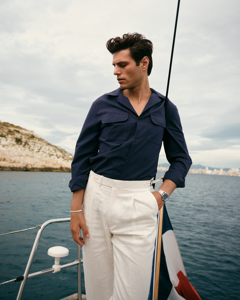 A polished stainless steel bangle in silver from Waldor & Co. One size. The model is Frost Bangle Polished.