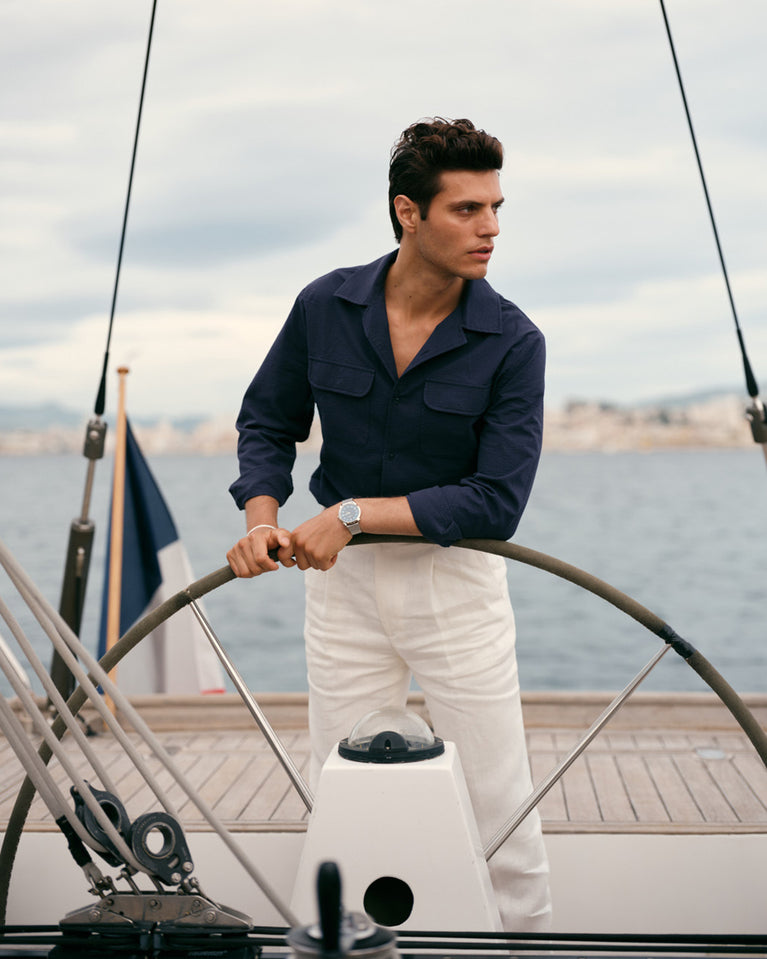 A polished stainless steel bangle in silver from Waldor & Co. One size. The model is Frost Bangle Polished.