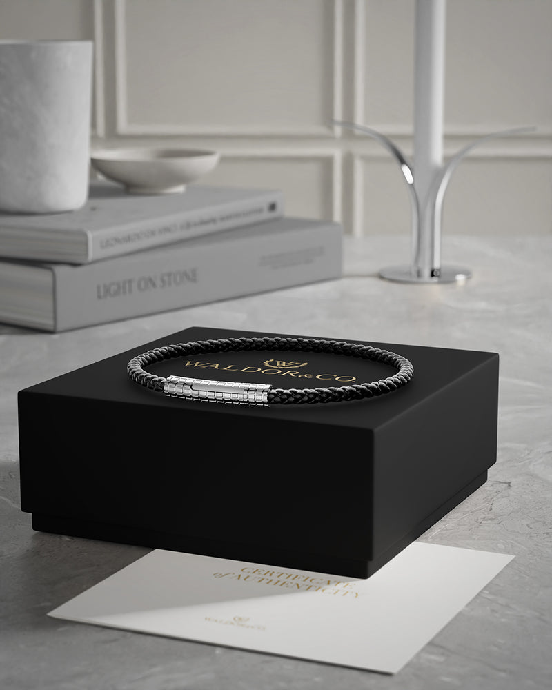 A Leather Bracelet in polished Silver plated-316L stainless steel from Waldor & Co. The model is Grid Leather Bracelet Polished.