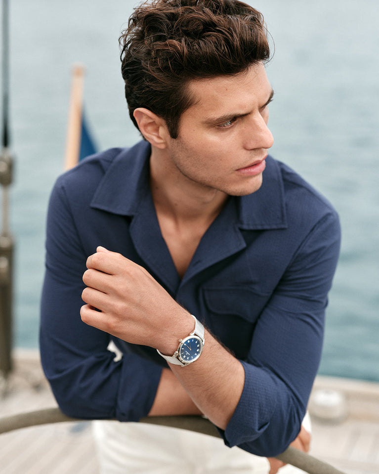 A round watch in silver from Waldor & Co. with blue sunray patterned dial. Ronda movement. The model is Original 40 Côte d'Azur 40mm.