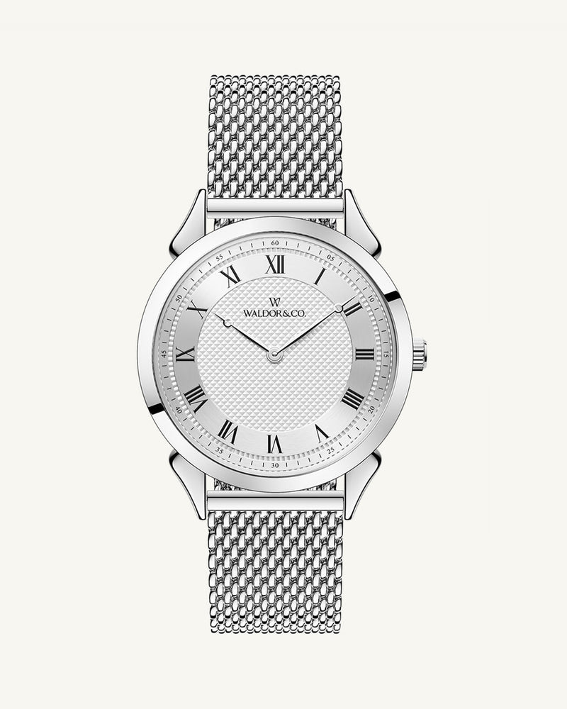 A round watch in silver from Waldor & Co. with white sunray patterned dial. Ronda movement. The model is Original 40 Côte d'Azur 40mm.