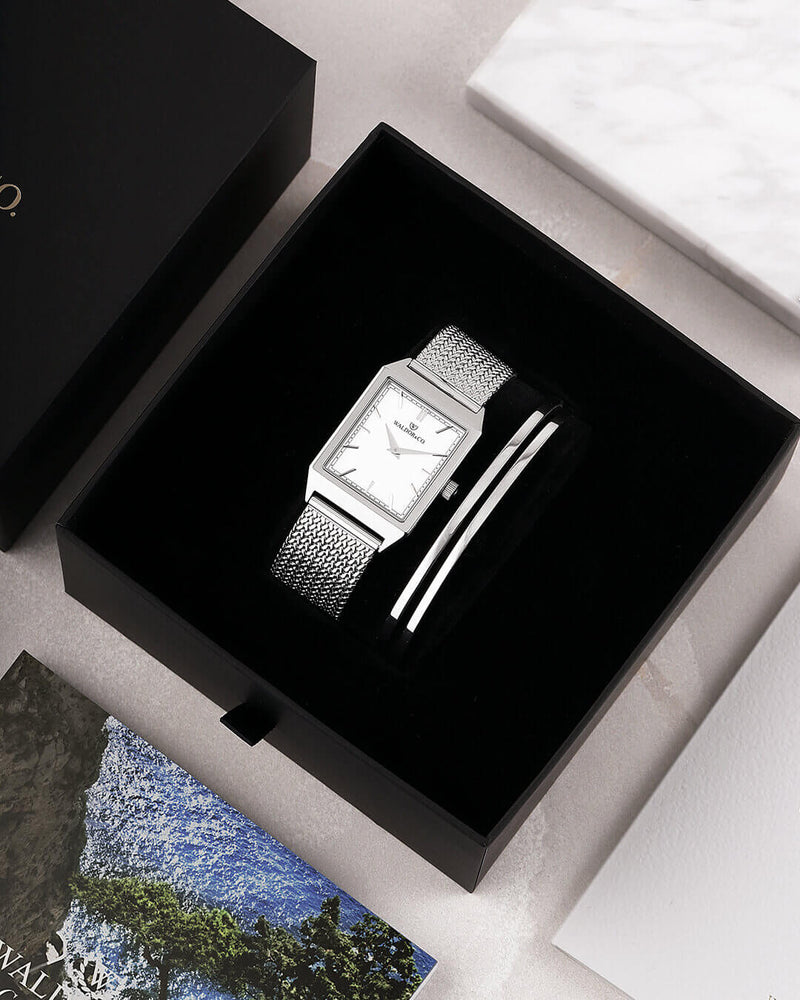 A square mens watch in rhodium-plated silver from Waldor & Co. with white sunray dial. Seiko movement. The model is Conceptual 37 Antibes.