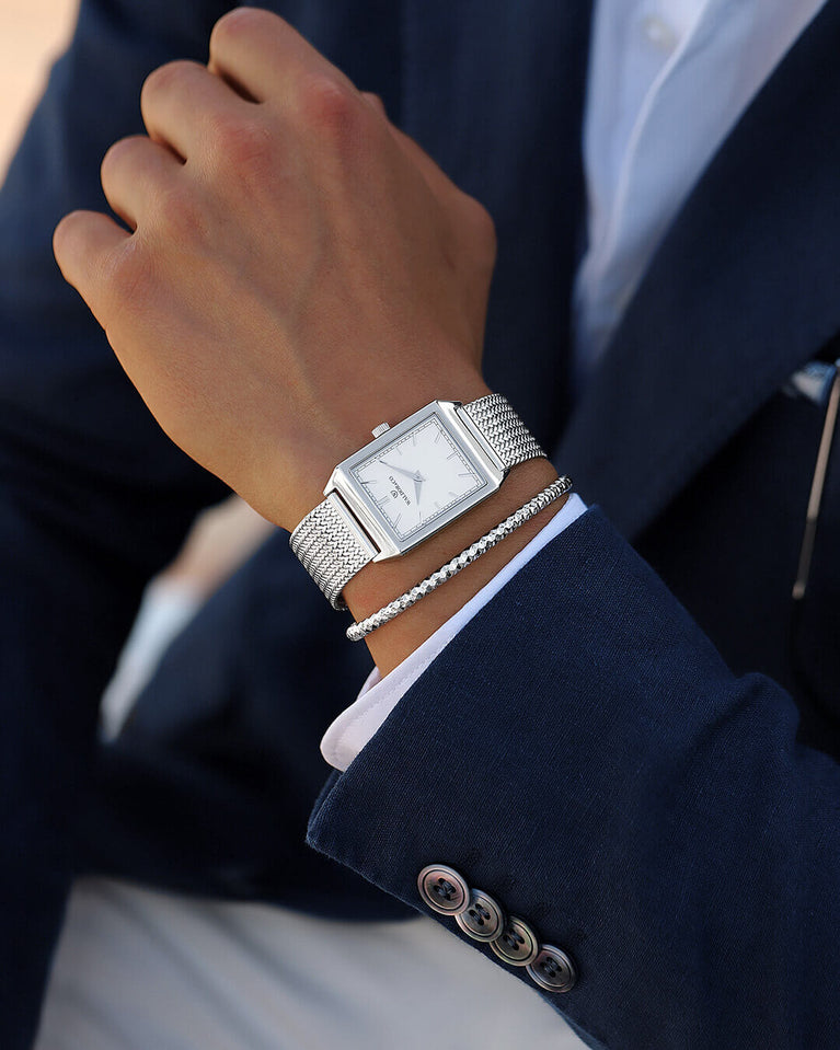  A square mens watch in rhodium-plated silver from Waldor & Co. with white sunray dial. Seiko movement. The model is Conceptual 37 Antibes.